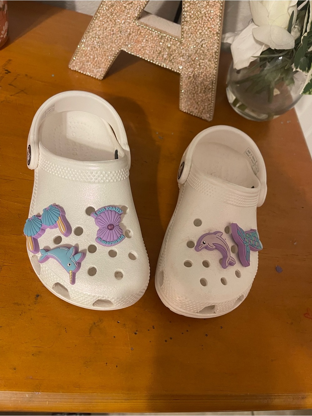 CROCS White Kids Clogs with Purple & Teal Sea Charms worn once